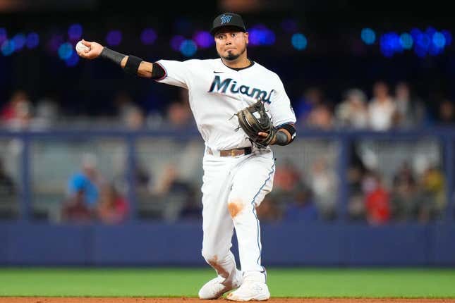 Aug 14, 2023; Miami, Florida, USA; Miami Marlins second baseman Luis Arraez (3) throws the ball to first base for an out against the Houston Astros during the fourth inning at loanDepot Park.