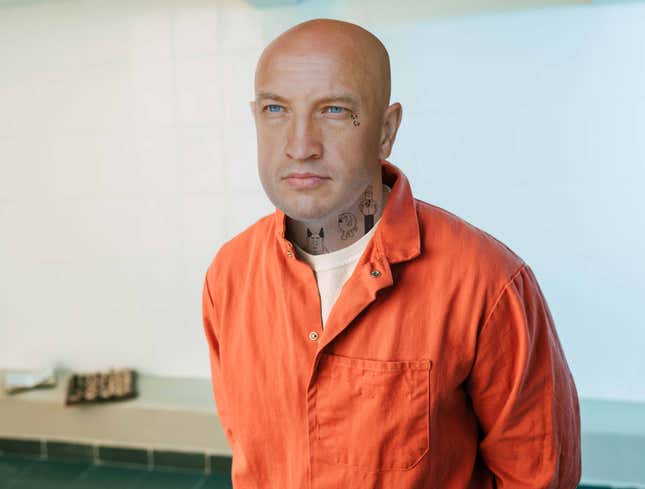 Image for article titled Leader Of Aryan Prison Gang Covered Head To Toe In Dilbert Tattoos