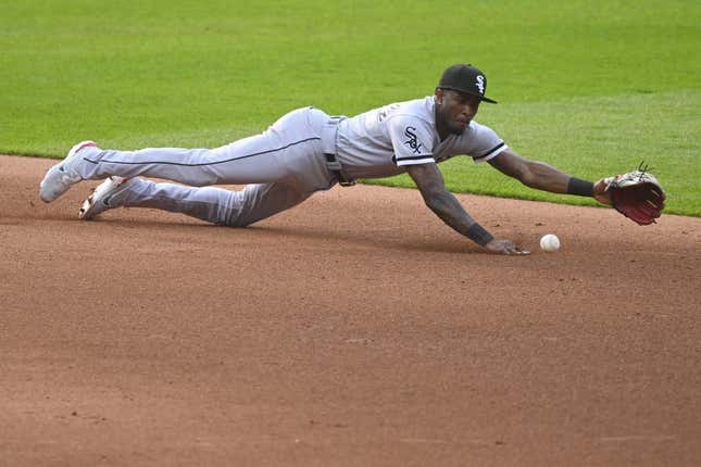 May 23, 2023; Cleveland, Ohio, USA; Chicago White Sox shortstop Tim Anderson (7) makes a diving stop of a ground ball in the fourth inning against the Cleveland Guardians at Progressive Field.