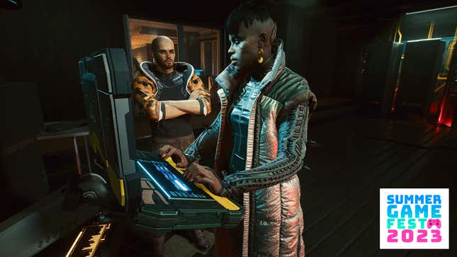 V and Brigitte are seen speaking while she types on a computer.