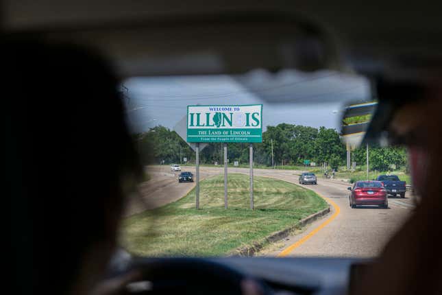 Lori Lamprich, volunteer driver with Midwest Access Coalition (MAC), drives her car from St. Louis, Missouri, over the state border to Illinois, on June 25, 2022. - Abortion is now banned in Lori Lamprich’s home state of Missouri, but that hasn’t stopped her taking women to their appointments — she drives them across the Mississippi River to Illinois, where it remains legal. “I’m here to fight the power and do what I can and resist these laws that I think are completely inhumane and unfair,” the 39-year-old tells AFP at her house in St. Louis, a city of 300,000 people.