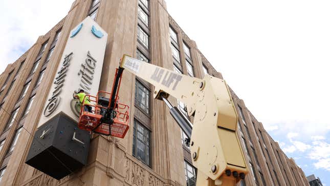  A worker removes letters from the Twitter sign that is posted on the exterior of Twitter headquarters on July 24, 2023 in San Francisco, California. Workers began removing the letters from the sign outside Twitter headquarters less than 24 hours after CEO Elon Musk officially rebranded Twitter as "X" and has changed its iconic bird logo, the biggest change he has made since taking over the social media platform. San Francisco police halted the sign removal shortly after it began.