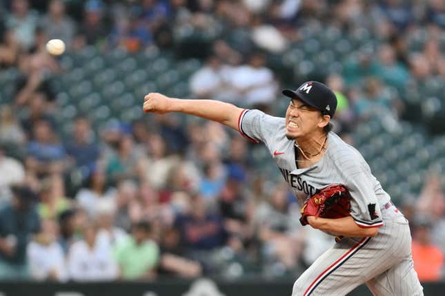 Jul 19, 2023; Seattle, Washington, USA; Minnesota Twins starting pitcher Kenta Maeda (18) pitches to the Seattle Mariners during the seventh inning at T-Mobile Park.