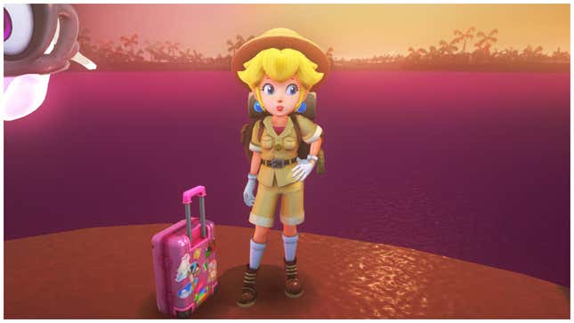 Princess Peach stands in beige adventuring wear, including shorts, boots, and a big hat, with a colorful suitcase by her side.