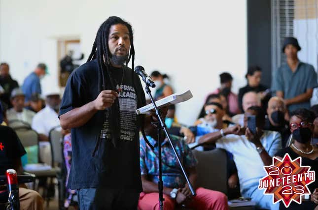 Christian Flagg, age 33, of LA, speaks during the California Reparations Task Force meeting to hear public input on reparations at the California Science Center in Los Angeles on Sept. 22, 2022.