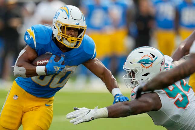Austin Ekeler did his part against the Dolphins in a 100-plus-yard rushing effort that included a touchdown.