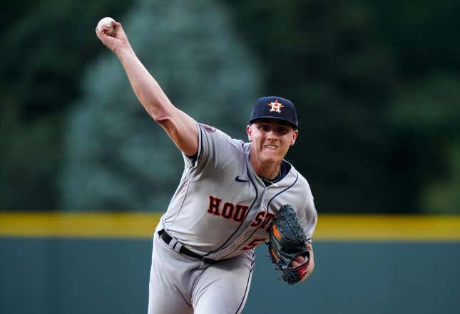 Jul 18, 2023; Denver, Colorado, USA; Houston Astros starting pitcher Hunter Brown (58) delivers a pitch in the first inning against the Colorado Rockies at Coors Field.