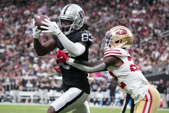 Aug 13, 2023; Paradise, Nevada, USA; Las Vegas Raiders wide receiver Kristian Wilkerson (83) catches the ball against San Francisco 49ers cornerback D&#39;Shawn Jamison (22) in the second half at Allegiant Stadium.