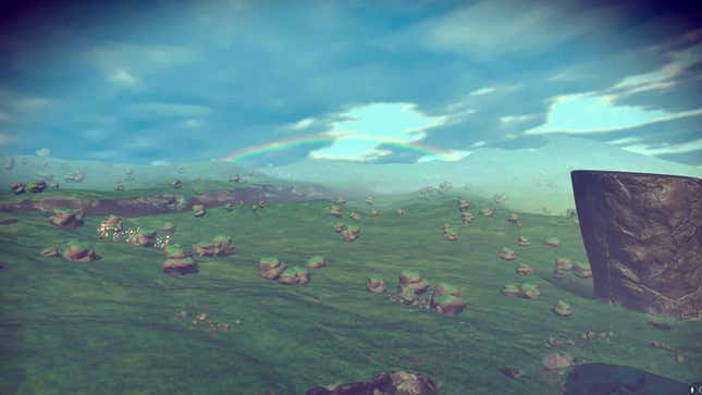 A rainbow stretches across a planet's surface.