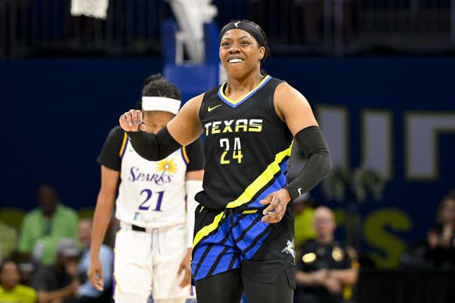 Jul 22, 2023; Arlington, Texas, USA; Dallas Wings guard Arike Ogunbowale (24) celebrates during the second half against the Los Angeles Sparks at College Park Center.
