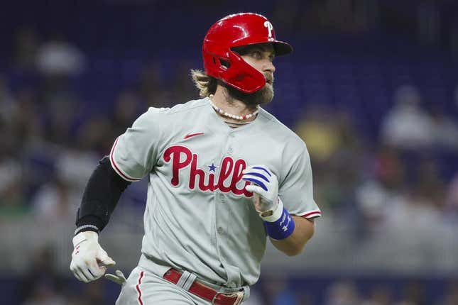 Aug 1, 2023; Miami, Florida, USA; Philadelphia Phillies first baseman Bryce Harper (3) runs toward first base after hitting a single against the Miami Marlins during the fourth inning at loanDepot Park.
