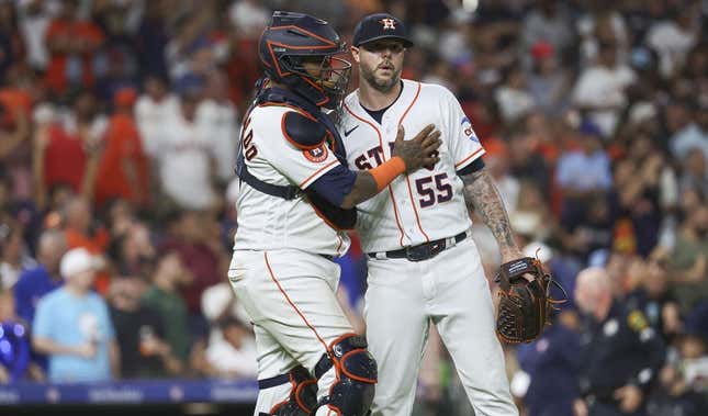 Jul 25, 2023; Houston, Texas, USA; Houston Astros catcher Martin Maldonado (15) celebrates with relief pitcher Ryan Pressly (55) after the game against the Texas Rangers at Minute Maid Park.