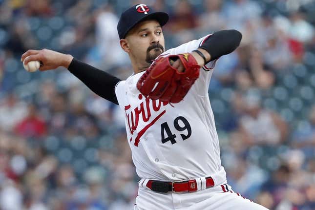 Jun 13, 2023; Minneapolis, Minnesota, USA; Minnesota Twins starting pitcher Pablo Lopez (49) throws to the Milwaukee Brewers in the first inning at Target Field.