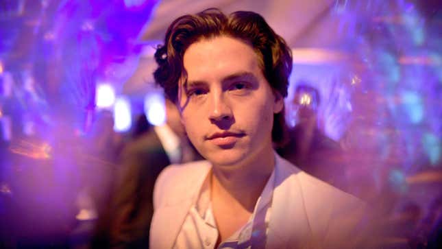 Image for article titled Cole Sprouse, Smoking Indoors, Is Almost Unrecognizable in Douchey Podcast Interview