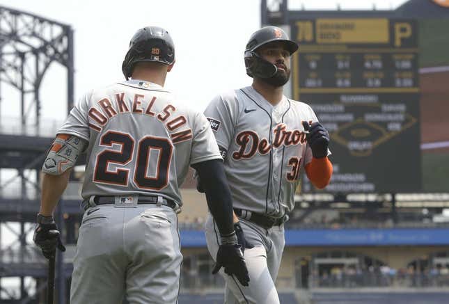 Aug 2, 2023; Pittsburgh, Pennsylvania, USA;  Detroit Tigers first baseman Spencer Torkelson (20) congratulates center fielder Riley Greene (31) crossing home plate on a solo home run against the Pittsburgh Pirates during the first inning at PNC Park.