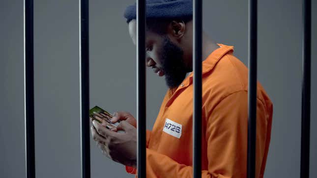 Image for article titled Prison Charges Inmate $1 Per Minute For Time With Photo Of Family