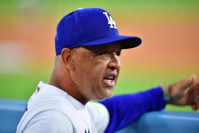 Jul 24, 2023; Los Angeles, California, USA; Los Angeles Dodgers manager Dave Roberts (30) watches game action against the Toronto Blue Jays during the fourth inning at Dodger Stadium.