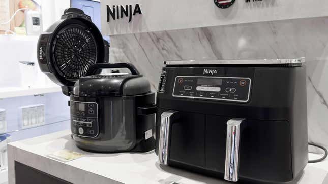 Two Ninja kitchen appliances on a display counter