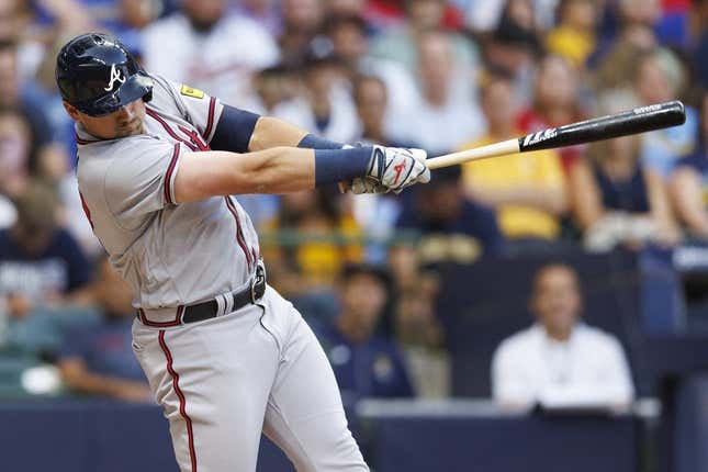 Jul 21, 2023; Milwaukee, Wisconsin, USA;  Atlanta Braves third baseman Austin Riley (27) hits a home run during the third inning against the Milwaukee Brewers at American Family Field.