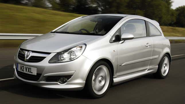 A photo of a silver Vauxhall Corsa hatchback. 