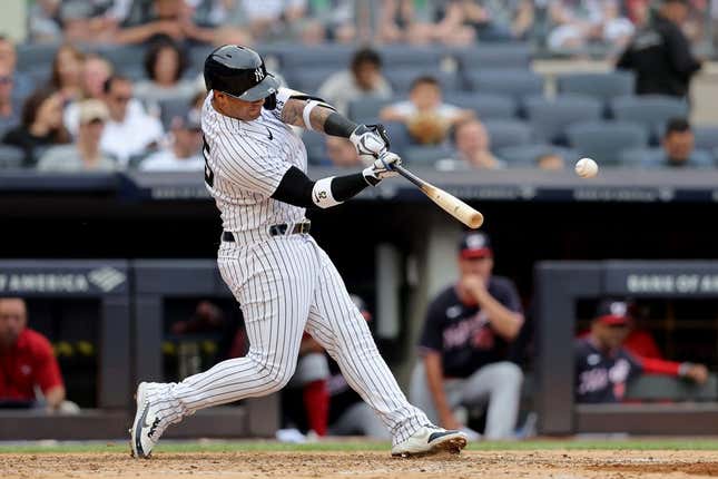 Aug 24, 2023; Bronx, New York, USA; New York Yankees second baseman Gleyber Torres (25) hits a two run home run against the Washington Nationals during the third inning at Yankee Stadium.