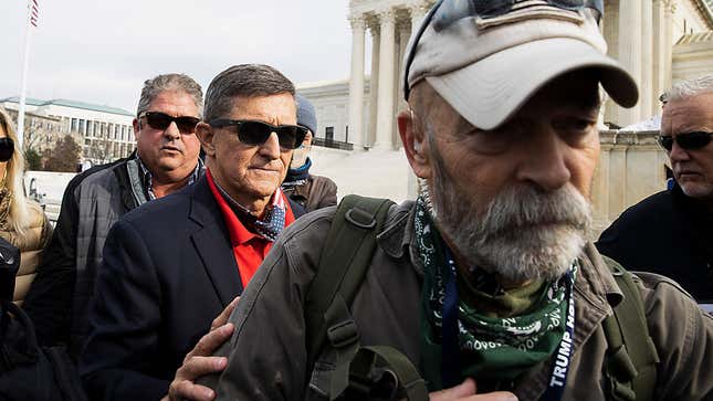 Former General Michael Flynn, center, protesting the outcome of the 2020 elections outside the Supreme Court on Dec. 12, 2020.