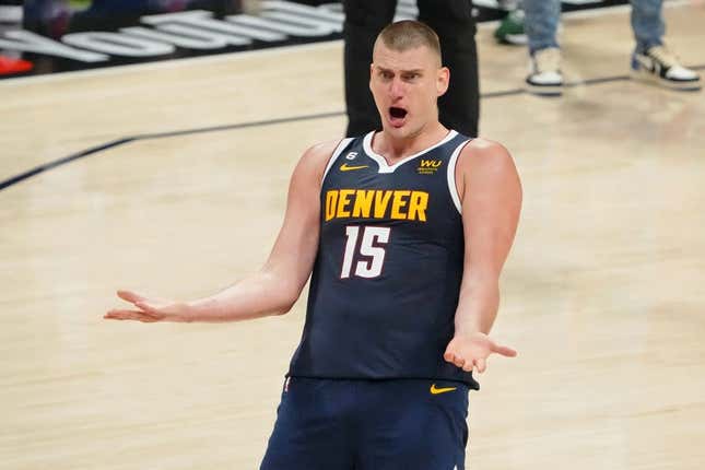 Jun 4, 2023; Denver, CO, USA; Denver Nuggets center Nikola Jokic (15) reacts after a play against the Miami Heat during the third quarter in game two of the 2023 NBA Finals at Ball Arena.
