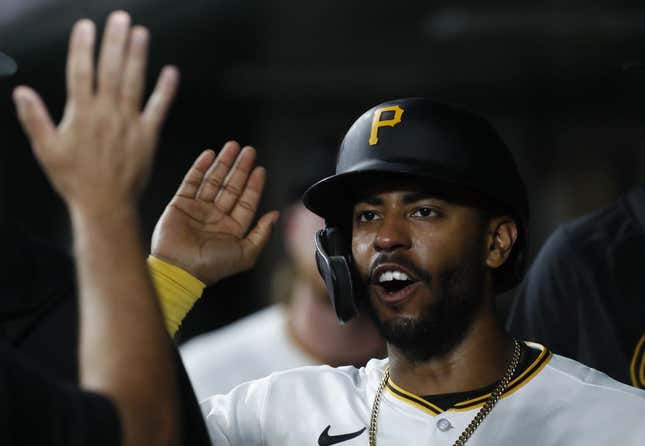 Aug 21, 2023; Pittsburgh, Pennsylvania, USA;  Pittsburgh Pirates right fielder Joshua Palacios (54) high-fives in the dugout after scoring a run against the St. Louis Cardinals during the eighth inning at PNC Park. Pittsburgh won 1-1.