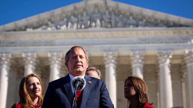 Texas Attorney General Ken Paxton speaks outside the U.S. Supreme Court on November 01, 2021 in Washington, DC. On Monday, the Supreme Court heard arguments in a challenge to the controversial Texas abortion law which bans abortions after 6 weeks.