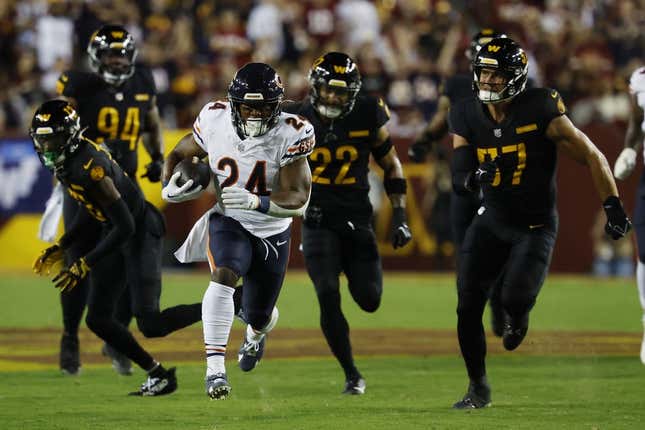 Khalil Herbert of the Chicago Bears runs with the ball during the