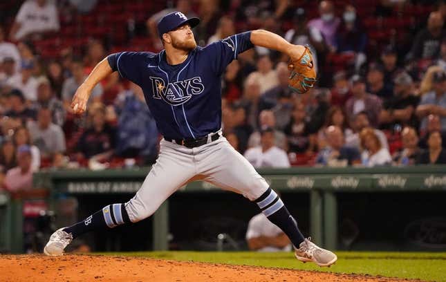 Sep 7, 2021; Boston, Massachusetts, USA; Tampa Bay Rays relief pitcher David Hess (60) throws a pitch against the Boston Red Sox in the eighth inning at Fenway Park.