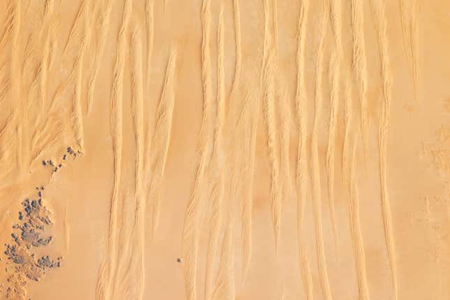 Image for article titled The abstract beauty of dunes seen from space