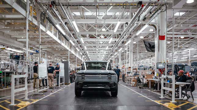 A photo of the front of a Rivian EV on the production line. 