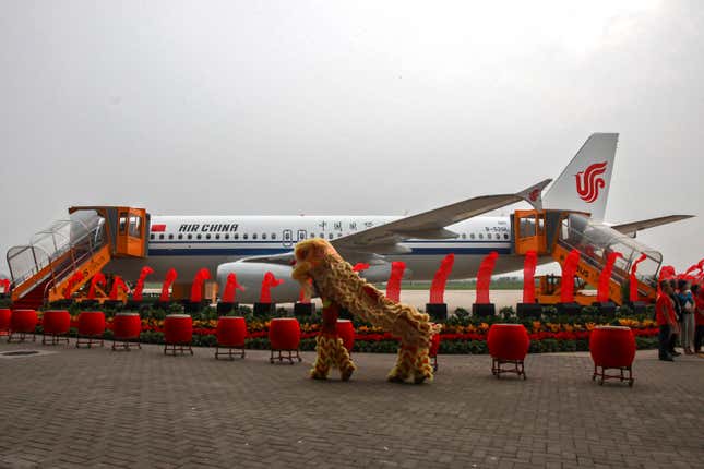 Dancers perform a lion dance near the 100th A320 airplane assembled at the Tianjin plant of Airbus in north China&#39;s Tianjin Municipality on Aug. 31, 2012. Multiple passengers were injured after an engine fire sent smoke into the cabin of Air China&#39;s Airbus A320 jetliner, the same model seen in this photo, that was landing in Singapore, prompting an evacuation of the aircraft Sunday, Sept. 10, 2023. Changi Airport said in a statement on its Facebook page. The flight was coming from the city of Chengdu in China&#39;s Sichuan province. (Chinatopix Via AP)