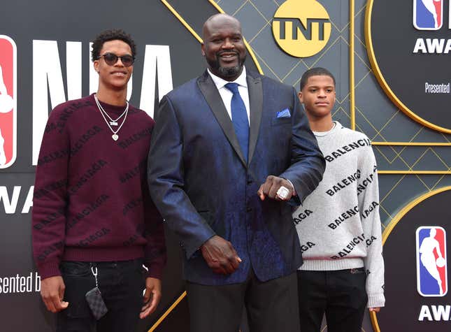 US retired basketball player Shaquille O’Neal (C) and his sons Shareef O’Neal (L) and Shaqir O’Neal (R) arrive for the 2019 NBA Awards at Barker Hangar on June 24, 2019 in Santa Monica, California.