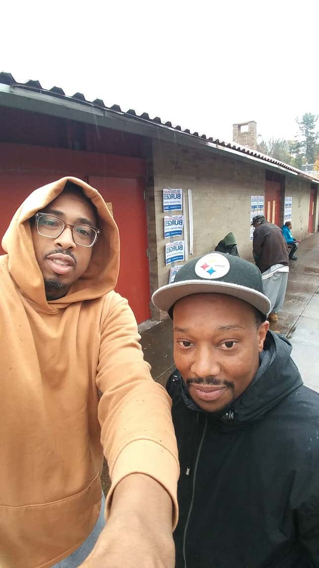 The author and Greg Brown Jr. at their polling place in Pittsburgh in 2019. Brown did 20 years of a triple life sentence before being exonerated over prosecutorial misconduct.