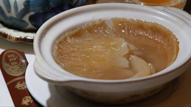 In this photo taken Thursday, Aug. 12, 2010, shark fin soup is displayed at a restaurant in Hong Kong. For centuries, shark fin - usually served as soup - has been a coveted delicacy in Chinese cooking, extolled for its supposed ability to boost sexual potency, enhance skin quality, increase one's energy (or "qi"), prevent heart diseases and lower cholesterol. However a growing grass-roots movement aims to remove the staple of gourmet Chinese cuisine from restaurant menus in this global hub of shark fin consumption. (AP Photo/Kin Cheung