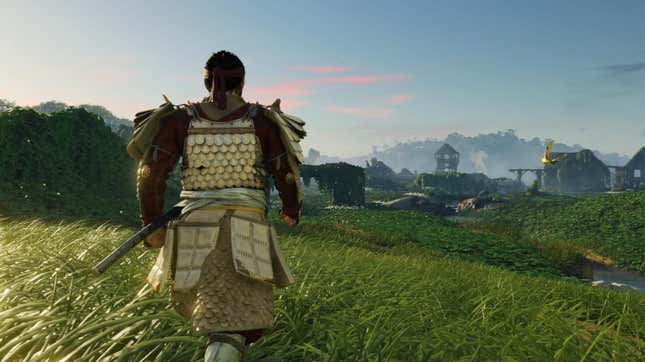 Ghost of Tsushima's protagonist walking through a field of grass. 