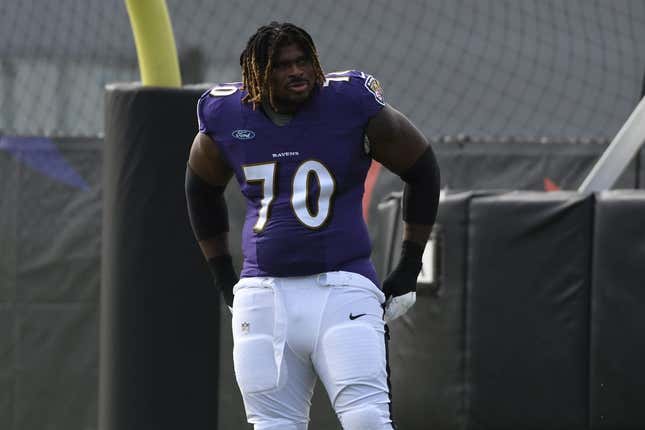 Aug 17, 2020; Owings Mills, Maryland, USA;  Baltimore Ravens guard D.J. Fluker (70) stands on the field during training camp at Under Armour Performance Center.