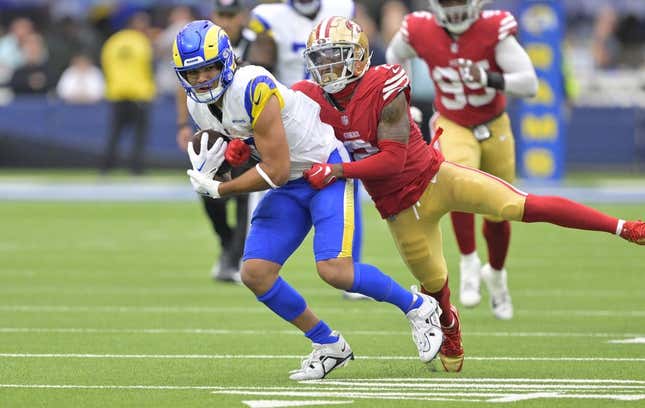 Sep 17, 2023; Inglewood, California, USA; Los Angeles Rams wide receiver Puka Nacua (17) is stopped by San Francisco 49ers cornerback Deommodore Lenoir (2) after a 32 yard pass play in the second half at SoFi Stadium.