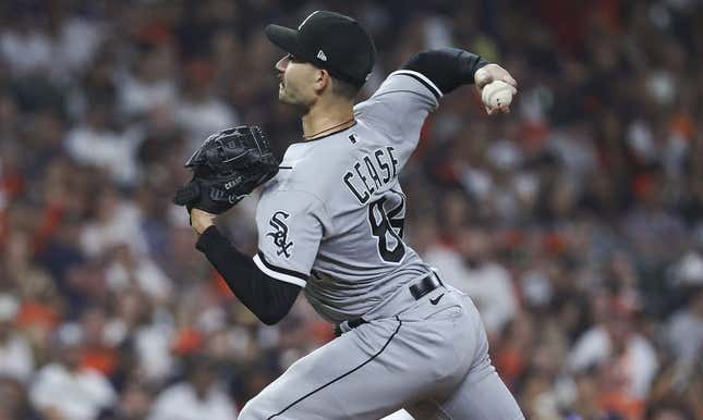 Chicago White Sox starting pitcher Dylan Cease (84) stands on the