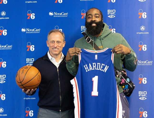 Feb 15, 2022; Camden, NJ, USA; Philadelphia 76ers guard James Harden (1) and owner Josh Harris (L) pose for a photo after speaking with the media at Philadelphia 76ers Training Complex.