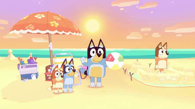 Bluey and her family play games on the beach. 