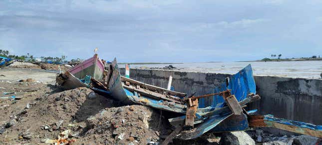 Broken boats at Madh Koliwada in the aftermath of Cyclone Takutae.