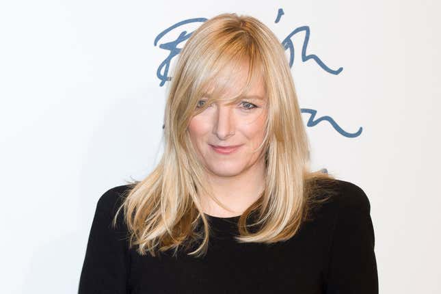 FILE - Sarah Burton arrives for the British Fashion Awards 2011 at a central London venue, on Nov. 28, 2011. The fashion designer who created the wedding dress of Kate, the Princess of Wales, is stepping down as creative director at Alexander McQueen after two decades at the brand, luxury group Kering said Monday Sept. 11, 2023. (AP Photo/Jonathan Short, File)
