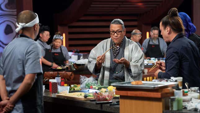 Masaharu Morimoto tasting sushi on 'Morimoto's Sushi Master' TV show