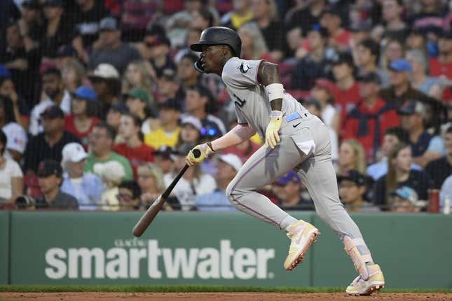 Jun 27, 2023; Boston, Massachusetts, USA; Miami Marlins center fielder Jazz Chisholm (2) hits an RBI single during the fourth inning against the Boston Red Sox at Fenway Park.