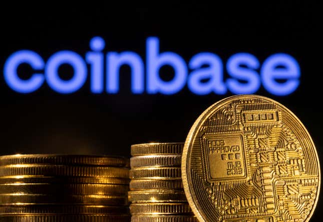 A representation of the cryptocurrency is seen in front of Coinbase logo in this illustration taken, March 4, 2022. 