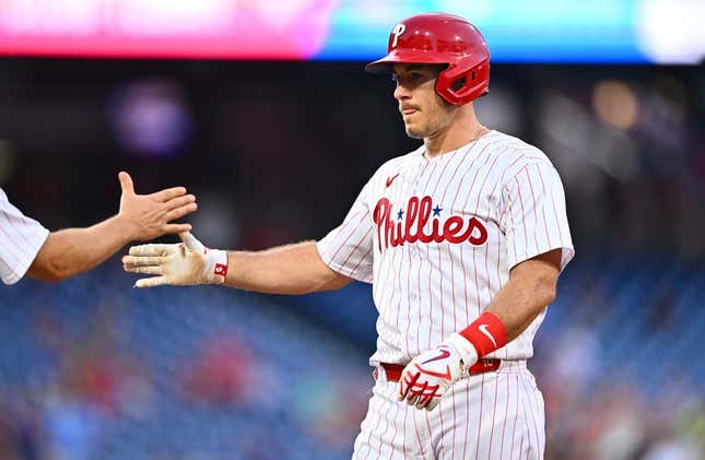 Aug 11, 2023; Philadelphia, Pennsylvania, USA; Philadelphia Phillies catcher J.T. Realmuto (10) reacts after hitting a RBI single against the Minnesota Twins in the second inning at Citizens Bank Park.