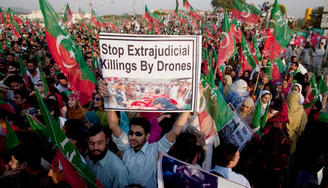 Pakistanis decry US drone attacks at a rally in 2011.